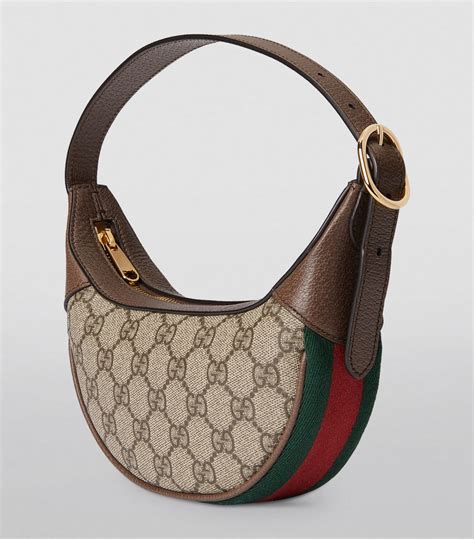 gucci cream embossed mini pouch|Gucci mini shoulder bags.